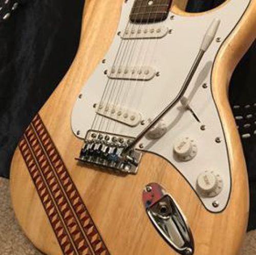 Mosaic veneer inlay on electric guitar by Wood Cave